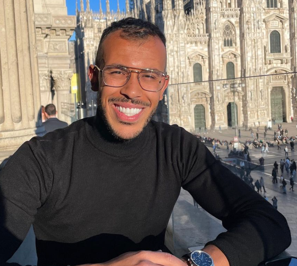 Anis Chity with the Duomo Cathedral of Milan on the background